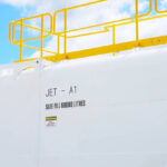 Large-capacity Jet A1 aviation fuel storage tank featuring high-visibility safety markings.